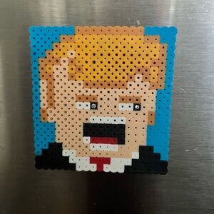 Trump magnet handmade from pearlier beads then ironed.